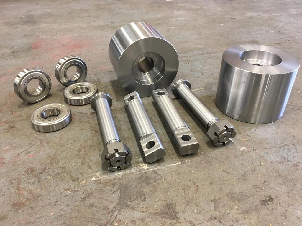 Precision metal shafts and components
